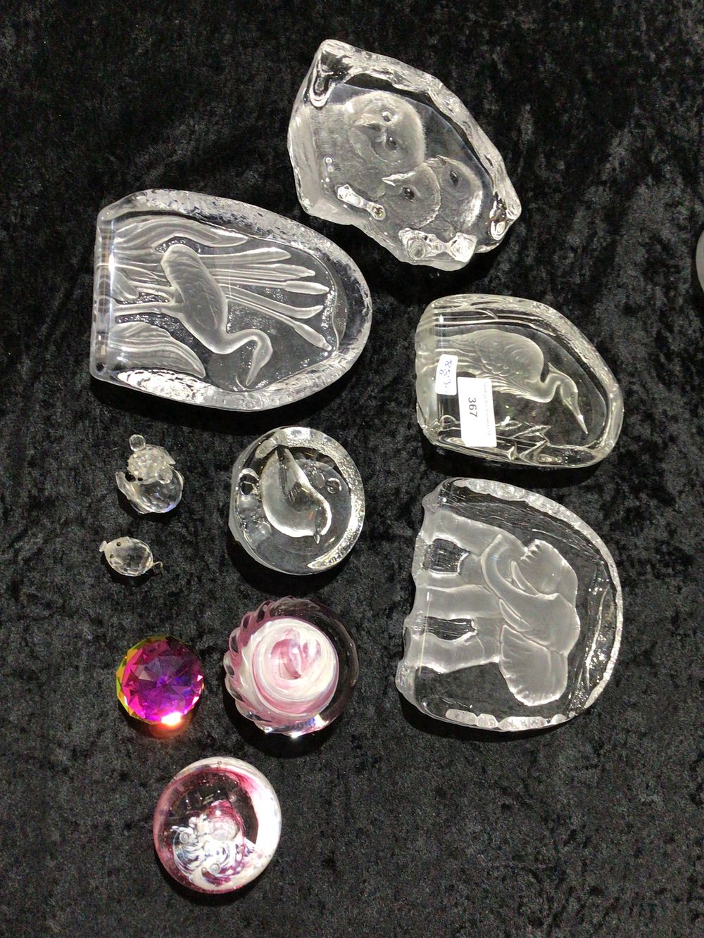 Lot 367: A Group of Mats Jonasson style Glass Paperweights