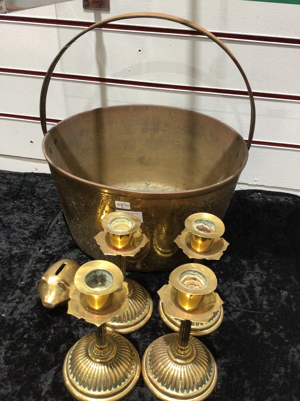 Lot 378: A Group of Brass Candlesticks, Copper Pot, and pig Money Box