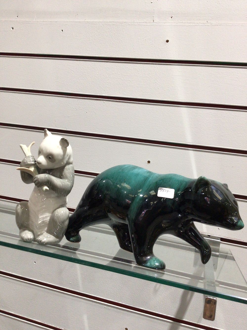 Lot 351: A Glossy Ceramic Bear Figurine with nao pands
