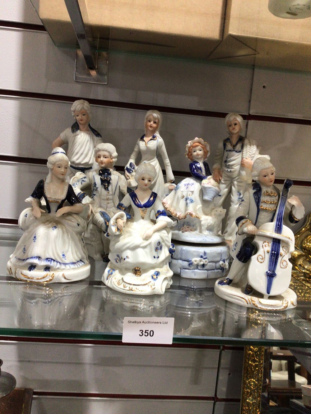 Lot 350: Eight Victorian Style Porcelain Figurines