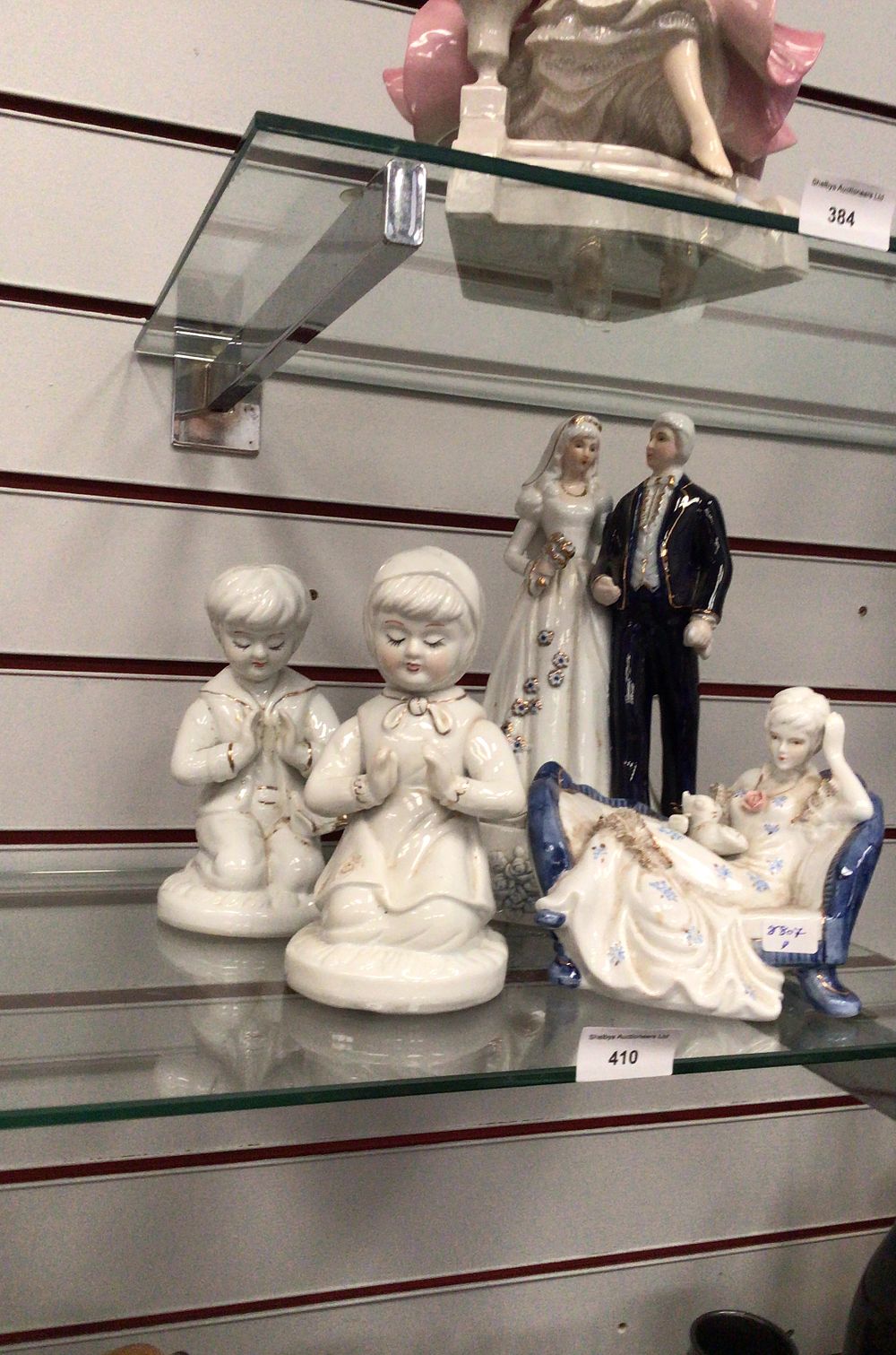 Lot 297: A Group of Four Porcelain Figurines