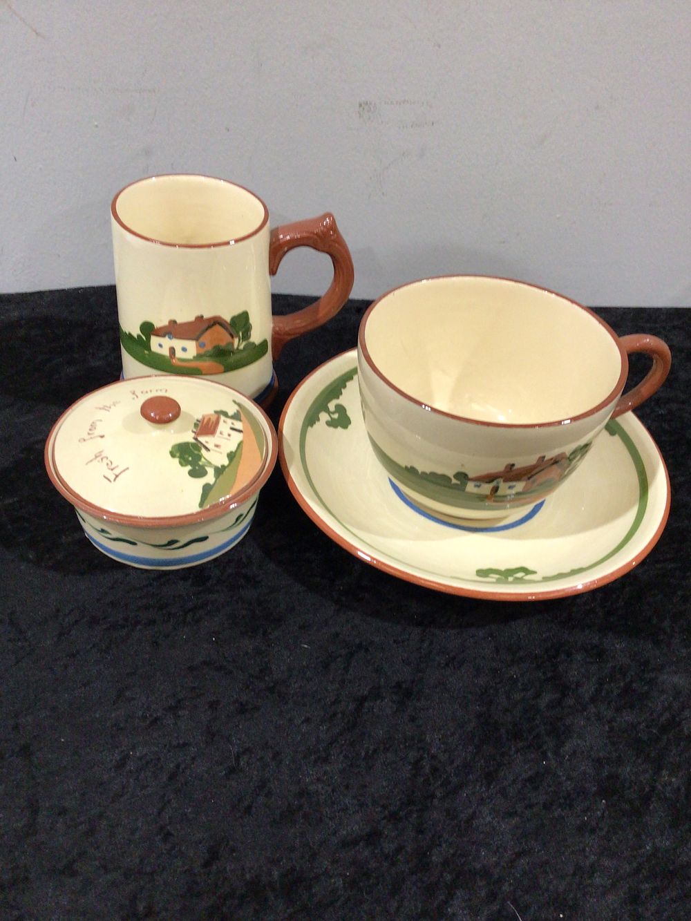Lot 156: A Three-Piece Dartmouth Pottery Devon Motto Ware Ceramic Set