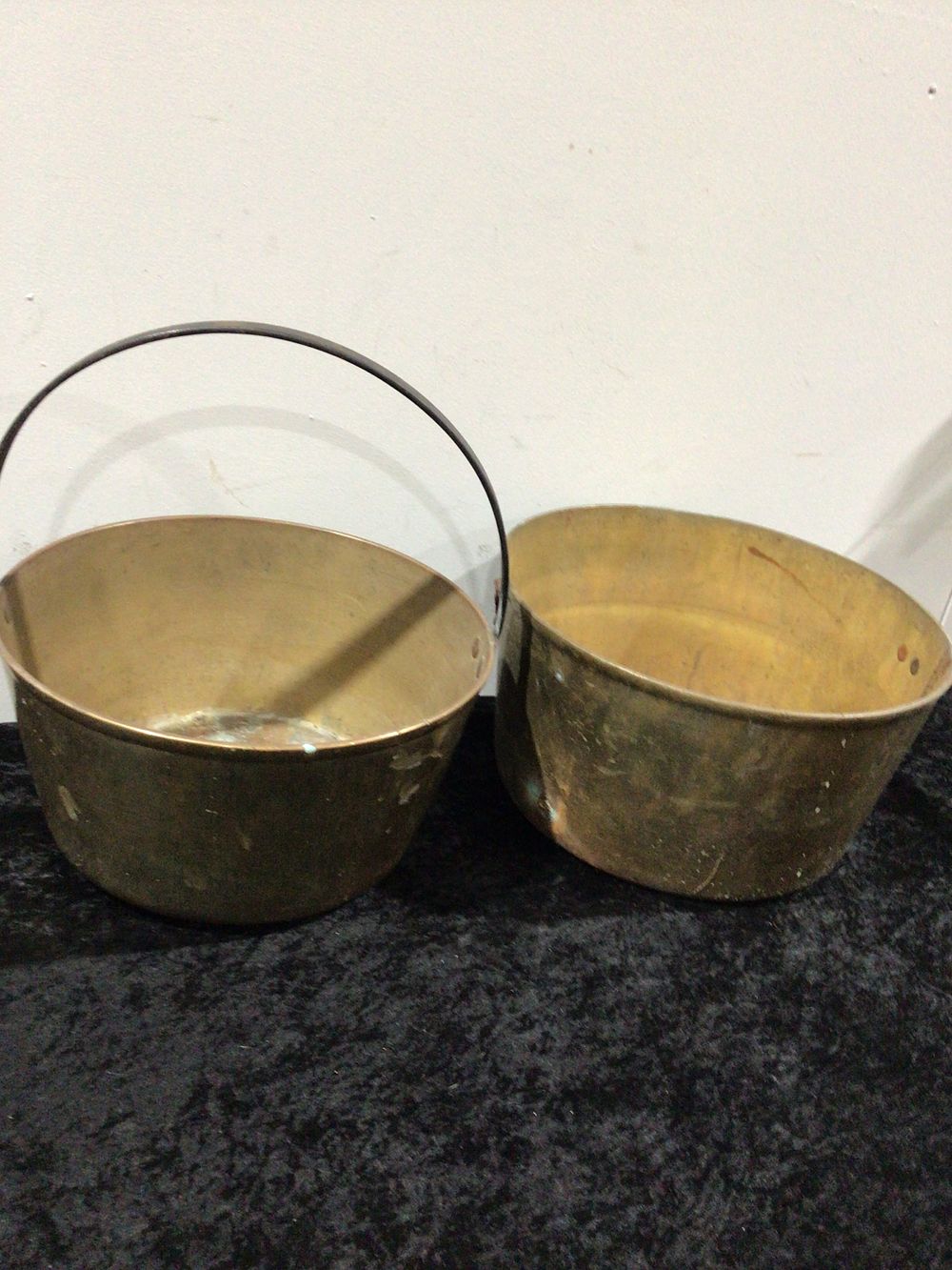 Lot 175: A Pair of Brass Utilitarian pans one with handle