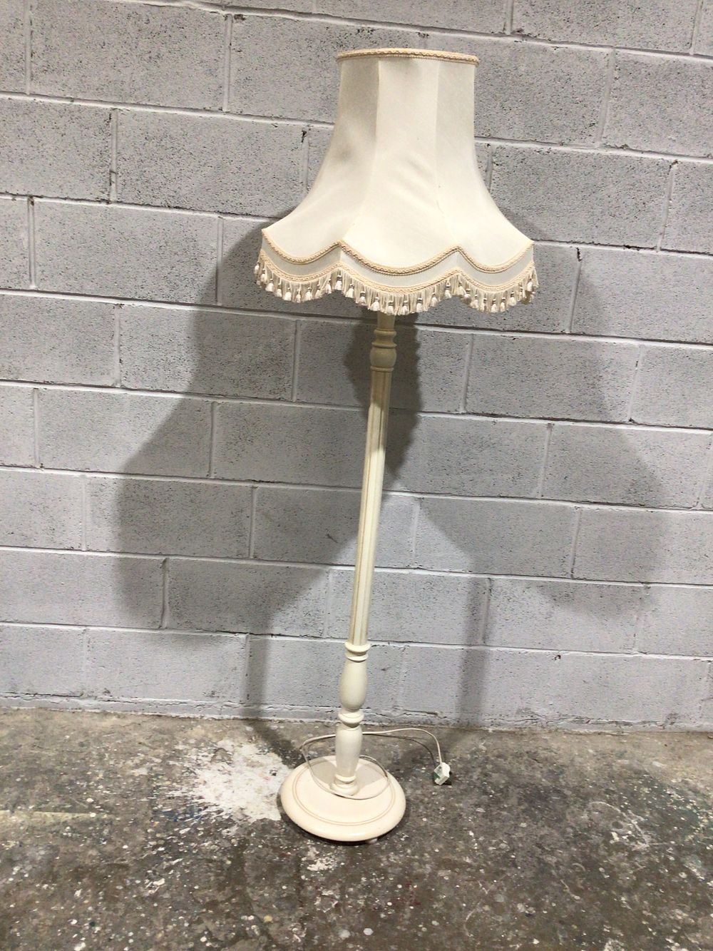 Lot 257: A Victorian Style Cream-Painted Floor Lamp with Fabric Shade