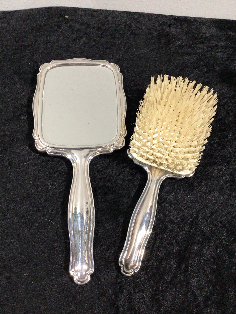Lot 270: A Three-Piece Sterling Silver Mirror and Brush Vanity Set