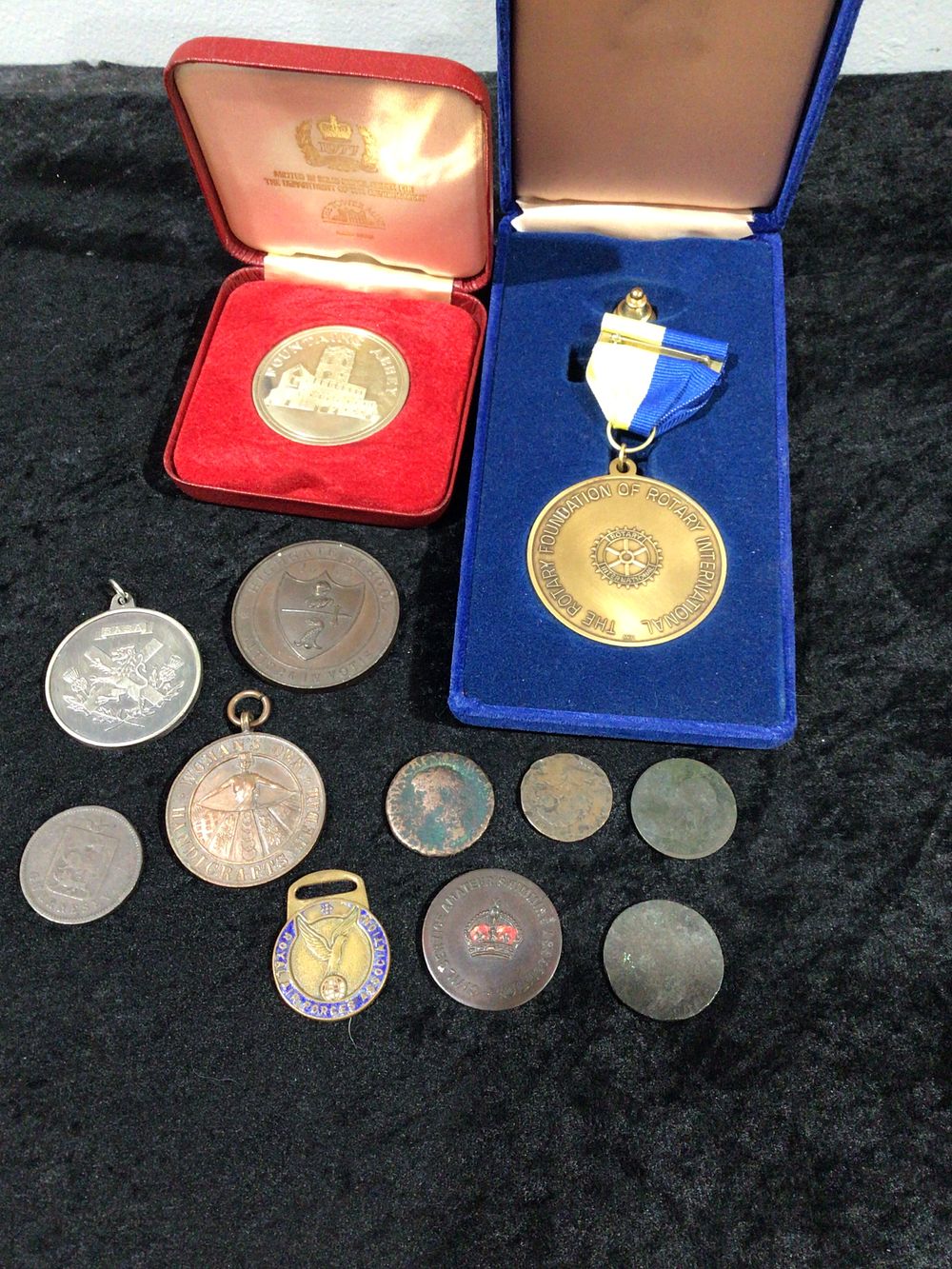 Lot 331: A Paul Harris Fellow Rotary Foundation International Medal and a Collection of Twelve Numismatic Items