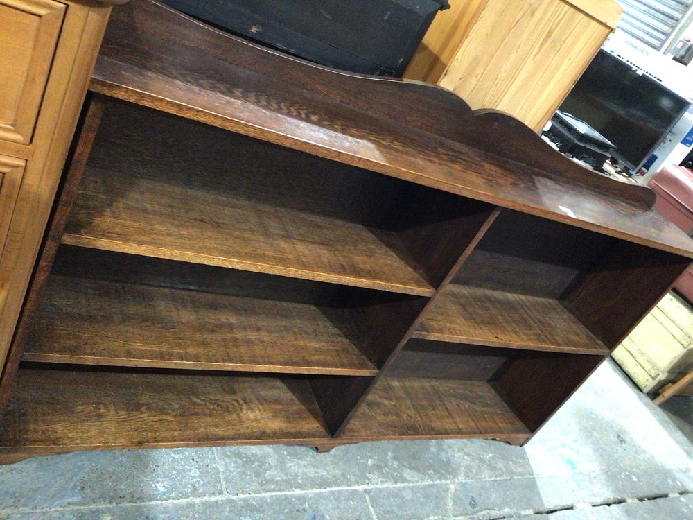 Lot 221: An Arts and Crafts Style Dark-Stained Oak Open Bookcase