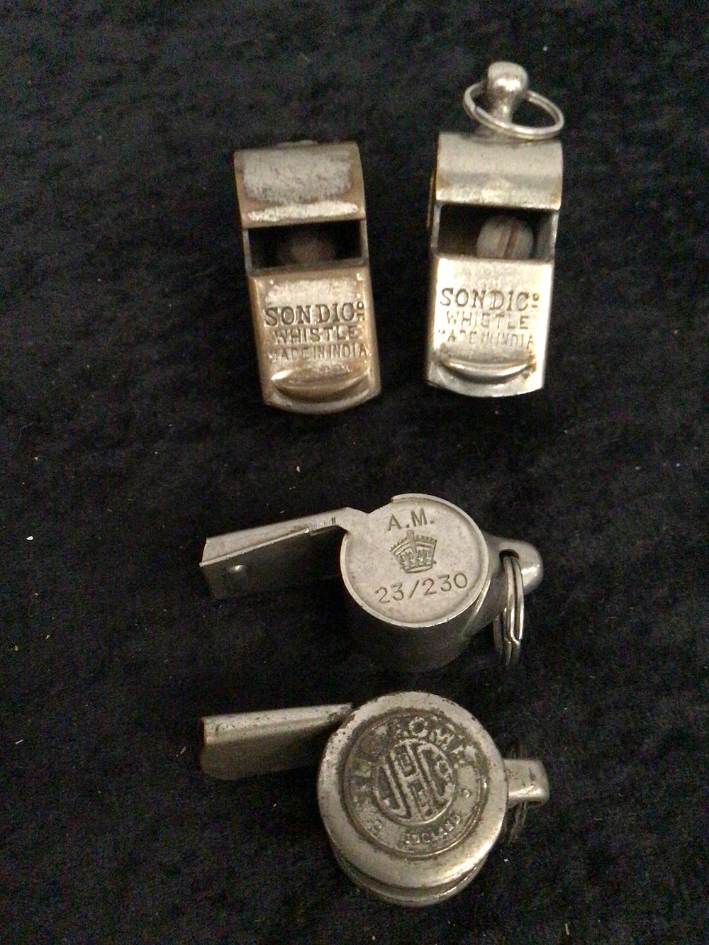 Lot 187: A Group of Four Whistles, including a WW2 RAF Ditching Whistle (A.M. 23/230)