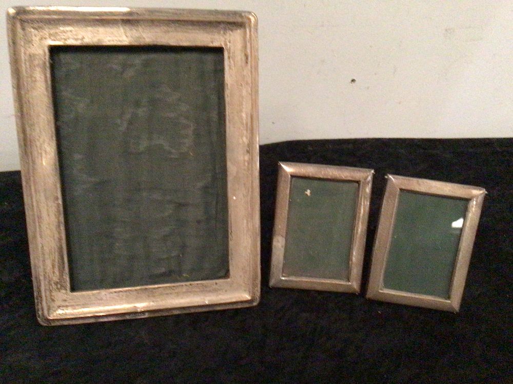 Lot 203: Three Early 20th Century Hallmarked Sterling Silver Photo Frames