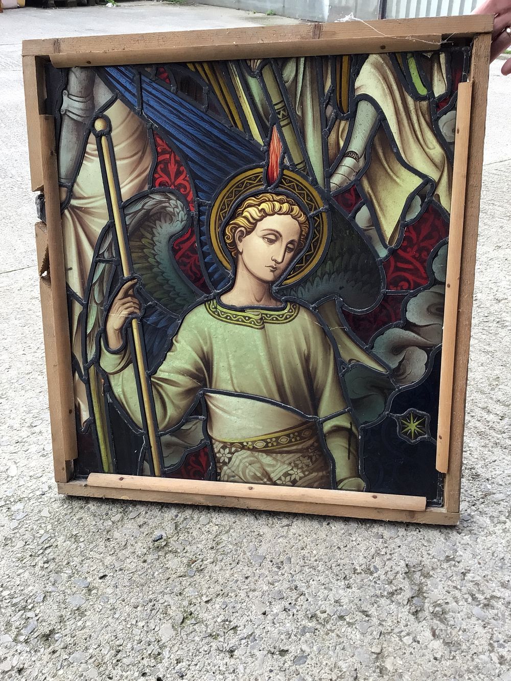 Lot 250: A Late 19th/Early 20th Century Stained Glass Panel Depicting a Religious Figure