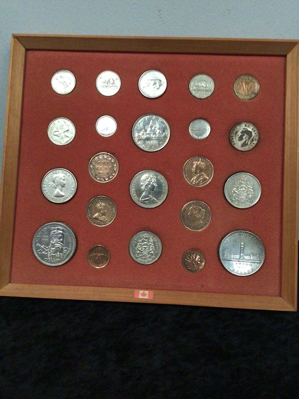 Lot 256: A Collection of Two Framed Coin Displays: Canadian and United States Coins in Wooden Shadow Boxes
