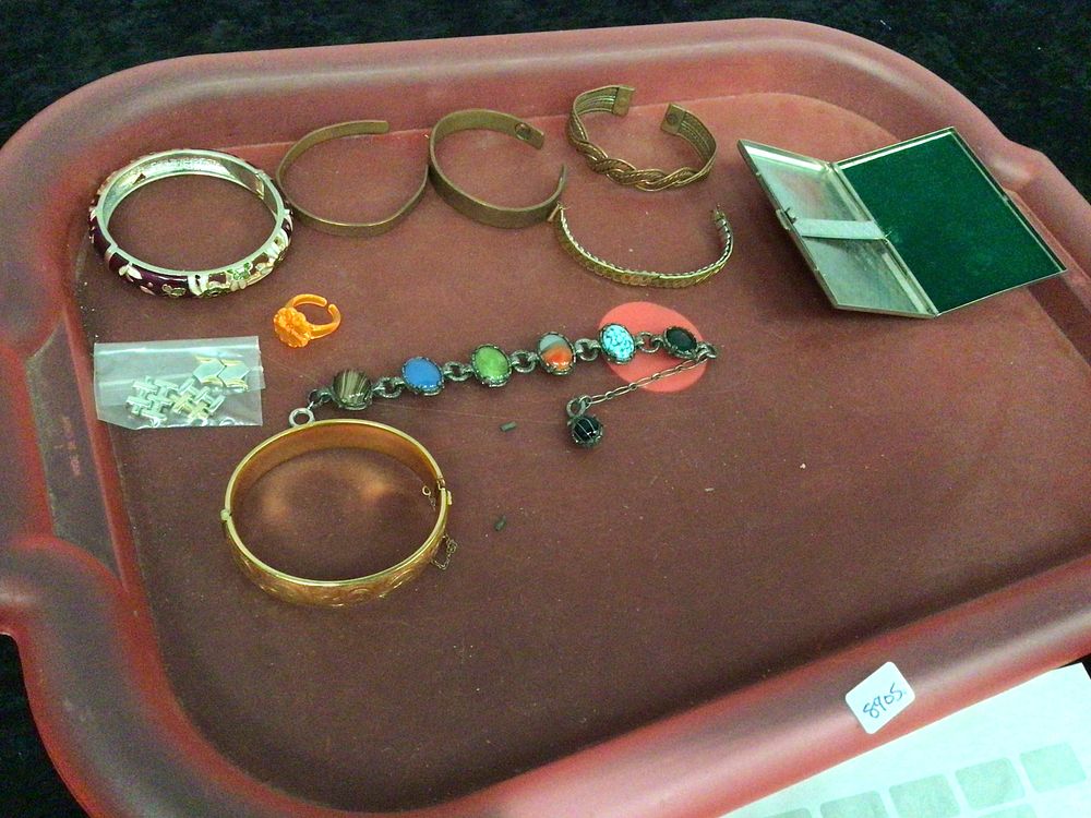 Lot 258: A Collection of Costume Jewelry including a 9ct Rolled Gold Engraved Hinged Bangle