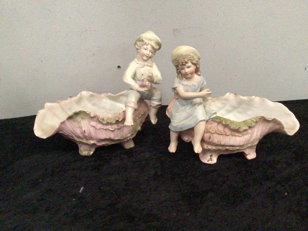 Lot 275: A Pair of Hand-Painted Porcelain Figural Shell Vessels, Late 19th/Early 20th Century
