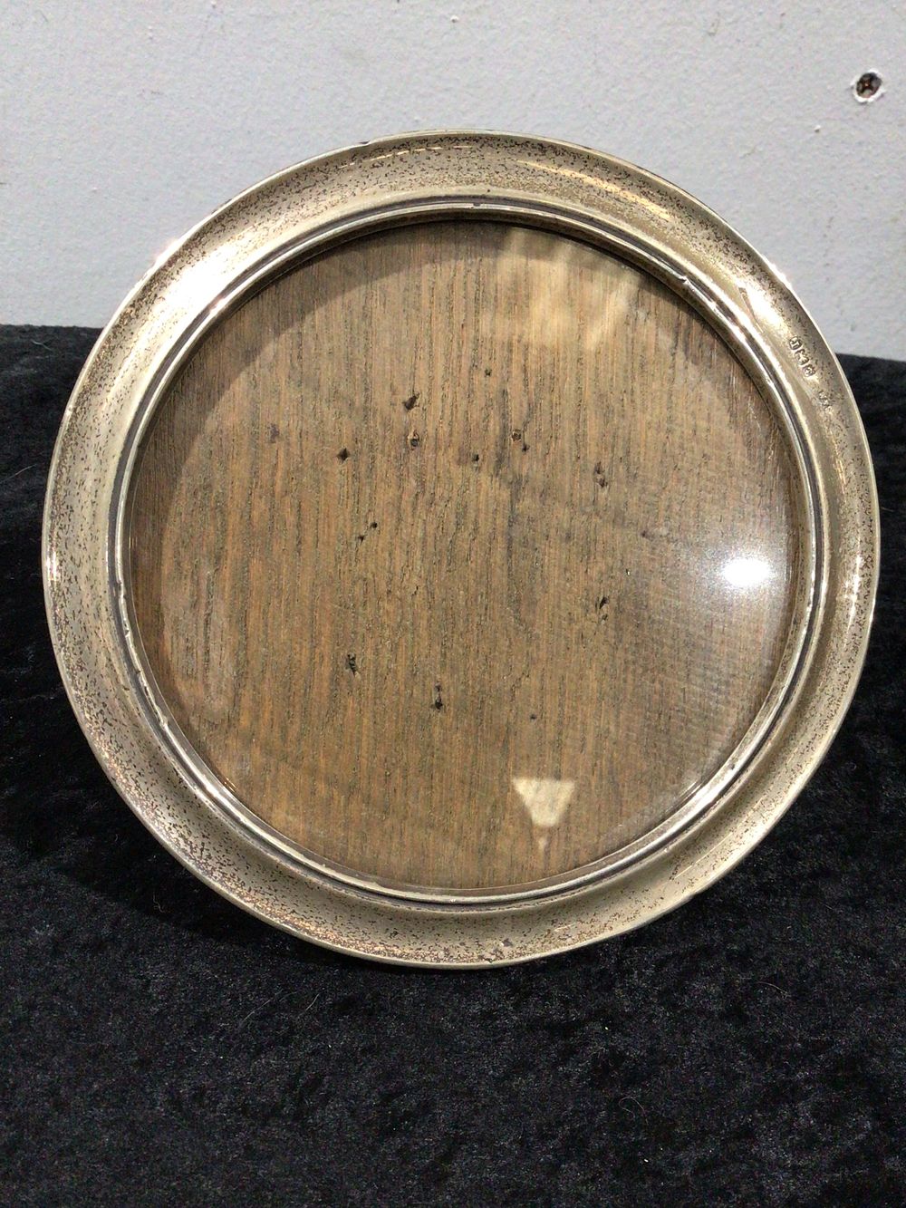 Lot 373: A British Sterling Silver Round Photo Frame