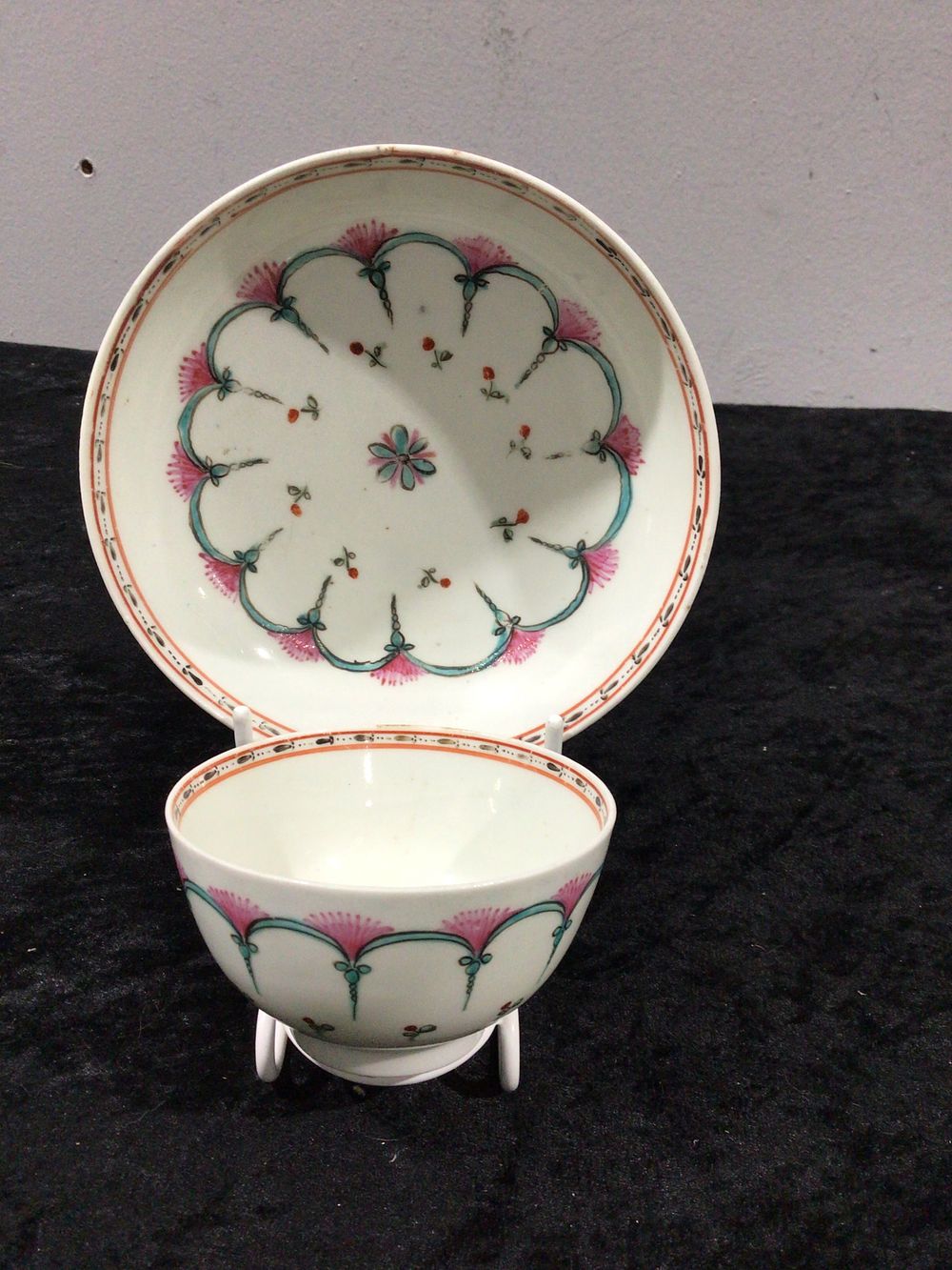 Lot 214: A Pair of 18th Century Qianlong Period Famille Rose Chinese Export Tea Bowl and Saucer