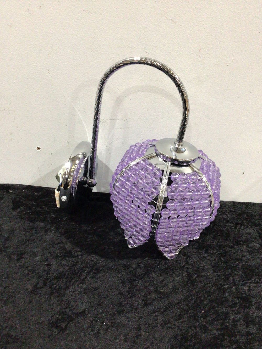 Lot 182: Four Chrome and Purple Beaded Wall Lights