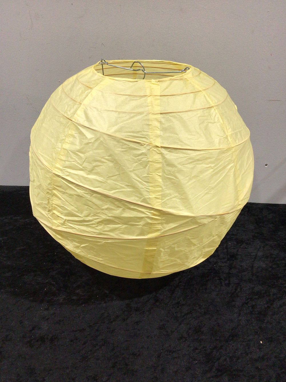 Lot 447: A Collection of 60 Yellow 16-Inch Round Paper Lanterns