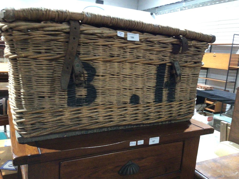 Lot 186: A Large Wicker Hamper with Leather Straps, Marked 'B.M.'