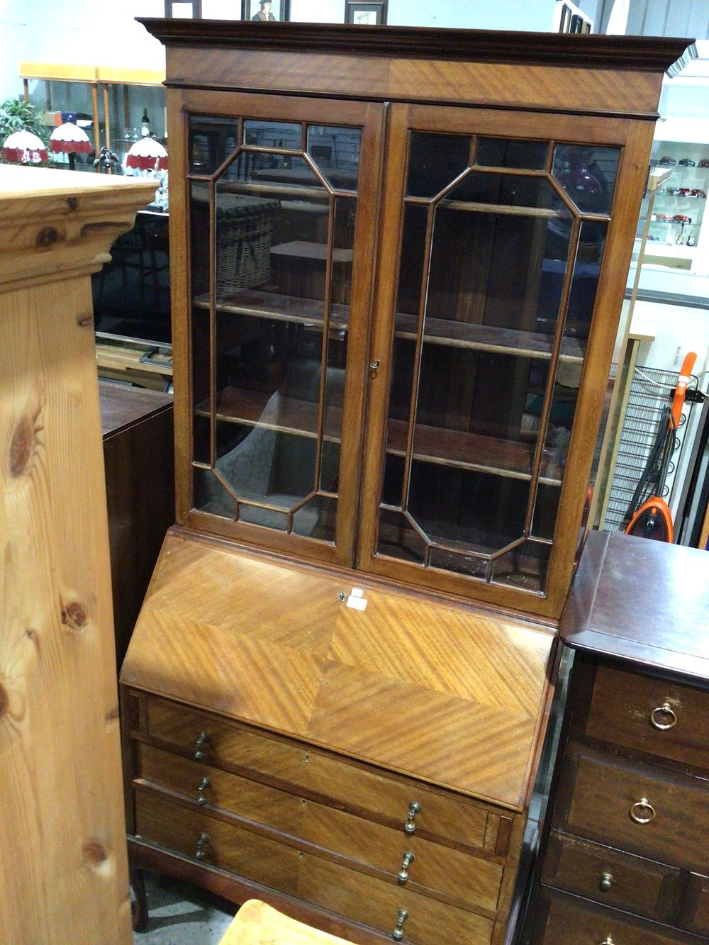 Lot 220: Reddish-Brown Wooden Secretary Desk with Chevron and Glazed Top