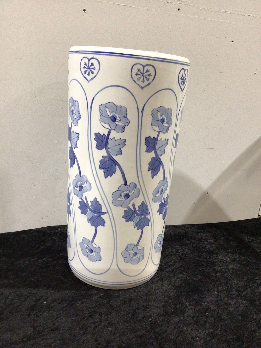 Lot 309: Blue and White Ceramic Umbrella Stand with Floral Decoration