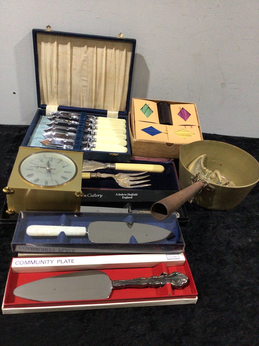 Lot 347: A Collection of Cutlery, Clock, Brassware, and Box
