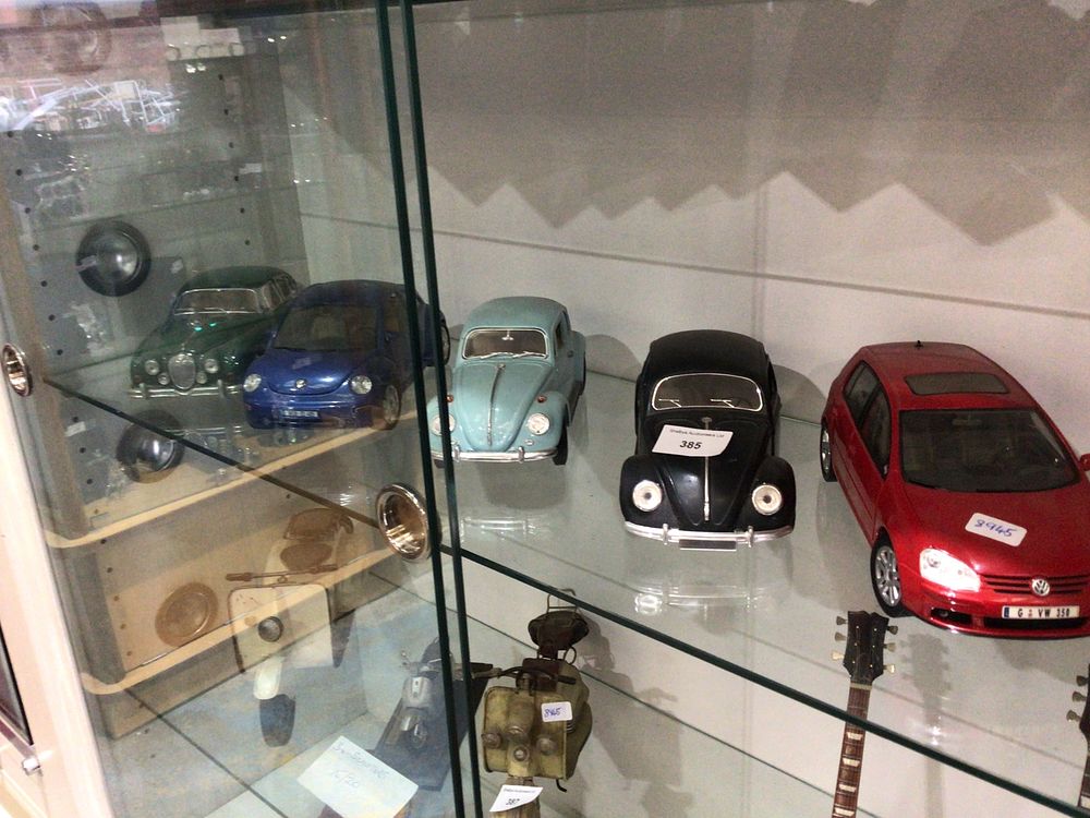 Lot 385: Five Burago Diecast Model Cars