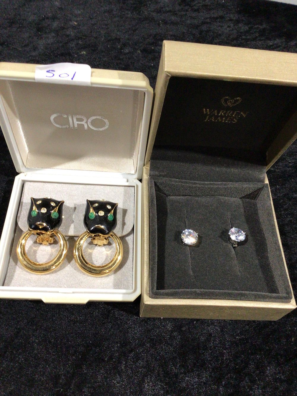 Lot 417: A Pair of Ciro Gold-Toned Panther Head Earrings And Silve Diamante Earrings