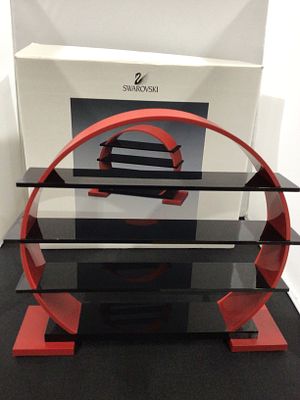 Swarovski Chinese Zodiac Display Stand, Red and Black. A Swarovski Chinese Zodiac Display Stand 
