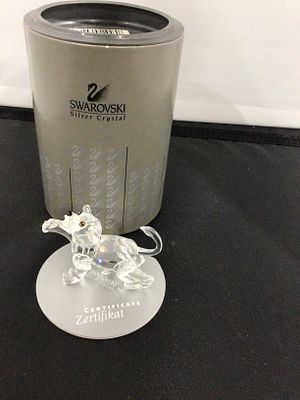 Swarovski Crystal Lion Cub Retired Figurine with Box and Stand. A Swarovski Crystal Lion Cub 