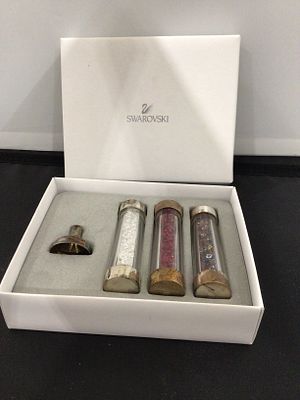 Swarovski Crystal Accents, A Set of Three Vials with Tool. A set of Swarovski crystal accents 