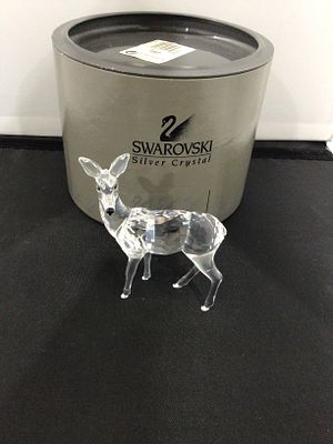 Swarovski Crystal Figurine, Doe (Fawn), Model #247963, with Original Box. A faceted clear 