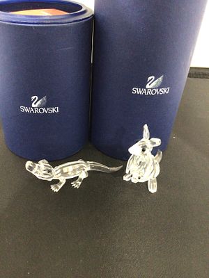A Pair of Swarovski Crystal Animal Figurines, with Original Boxes. A pair of clear, faceted 