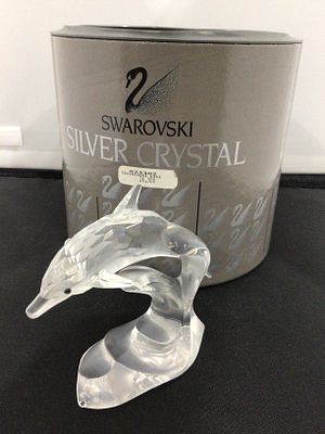 Swarovski Silver Crystal 'Dolphin on a Wave' Figurine. A Swarovski Silver Crystal 'Dolphin on a 