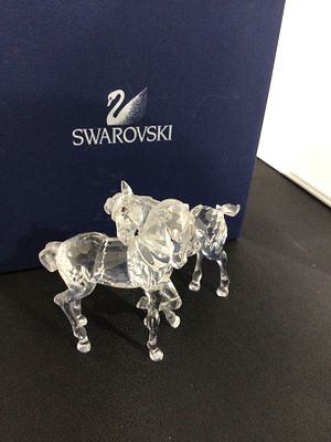 Swarovski Crystal Figurine, Playing Foals, Model 627637. A Swarovski crystal figurine depicting 