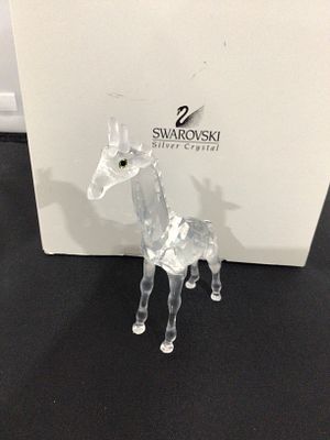 Swarovski 'Baby Giraffe' Crystal Figurine. A Swarovski 'Baby Giraffe' crystal figurine. The 