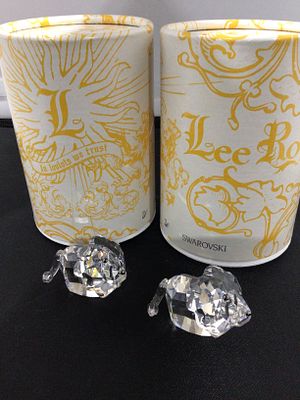 A Pair of Swarovski Crystal Lovlots Lee Roy Lion Figurines with Original Containers. A pair of 