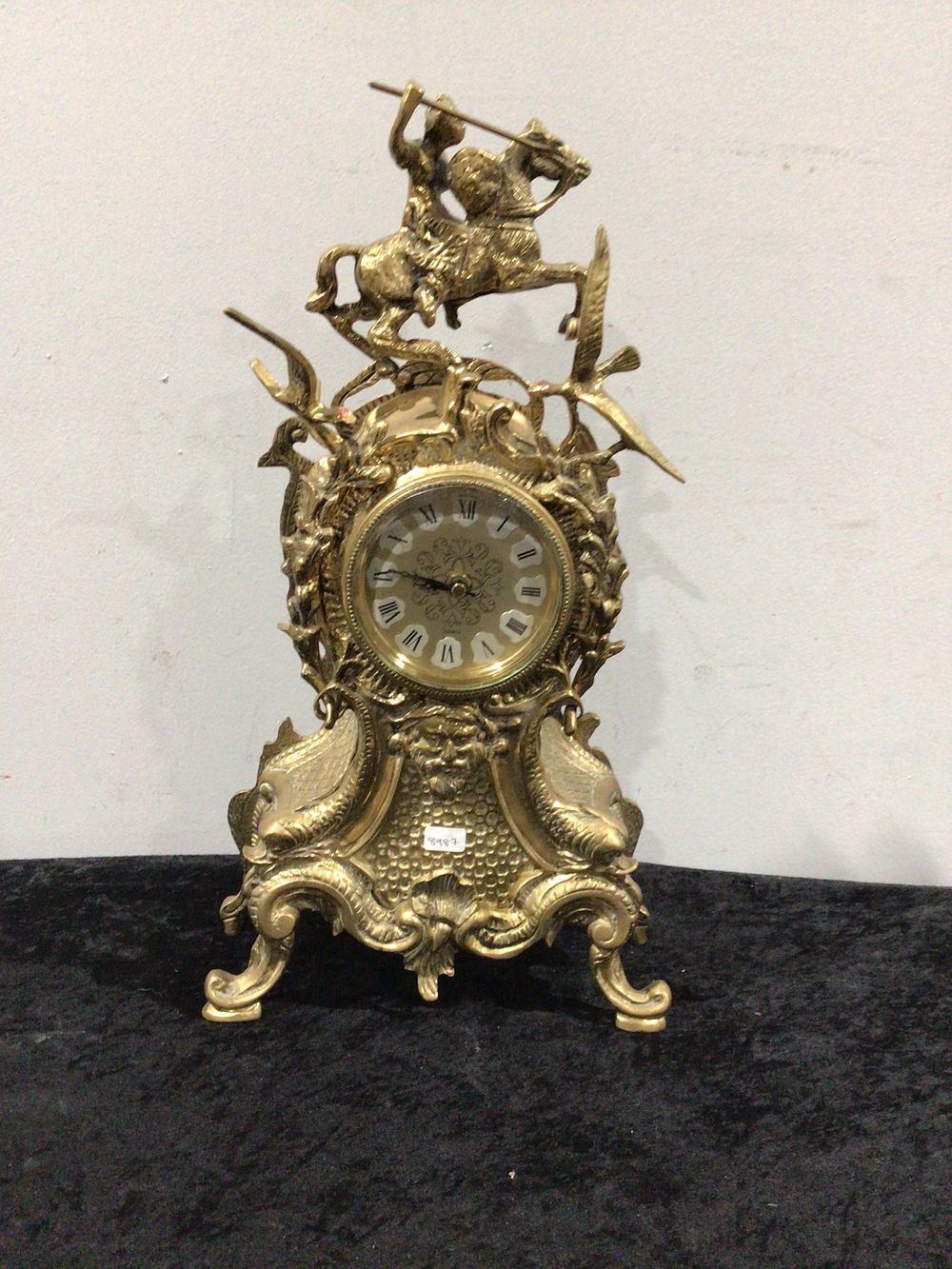 Lot 162: A Mid 21st Century Gilt Metal Rococo-Revival Battery Powered Mantel Clock