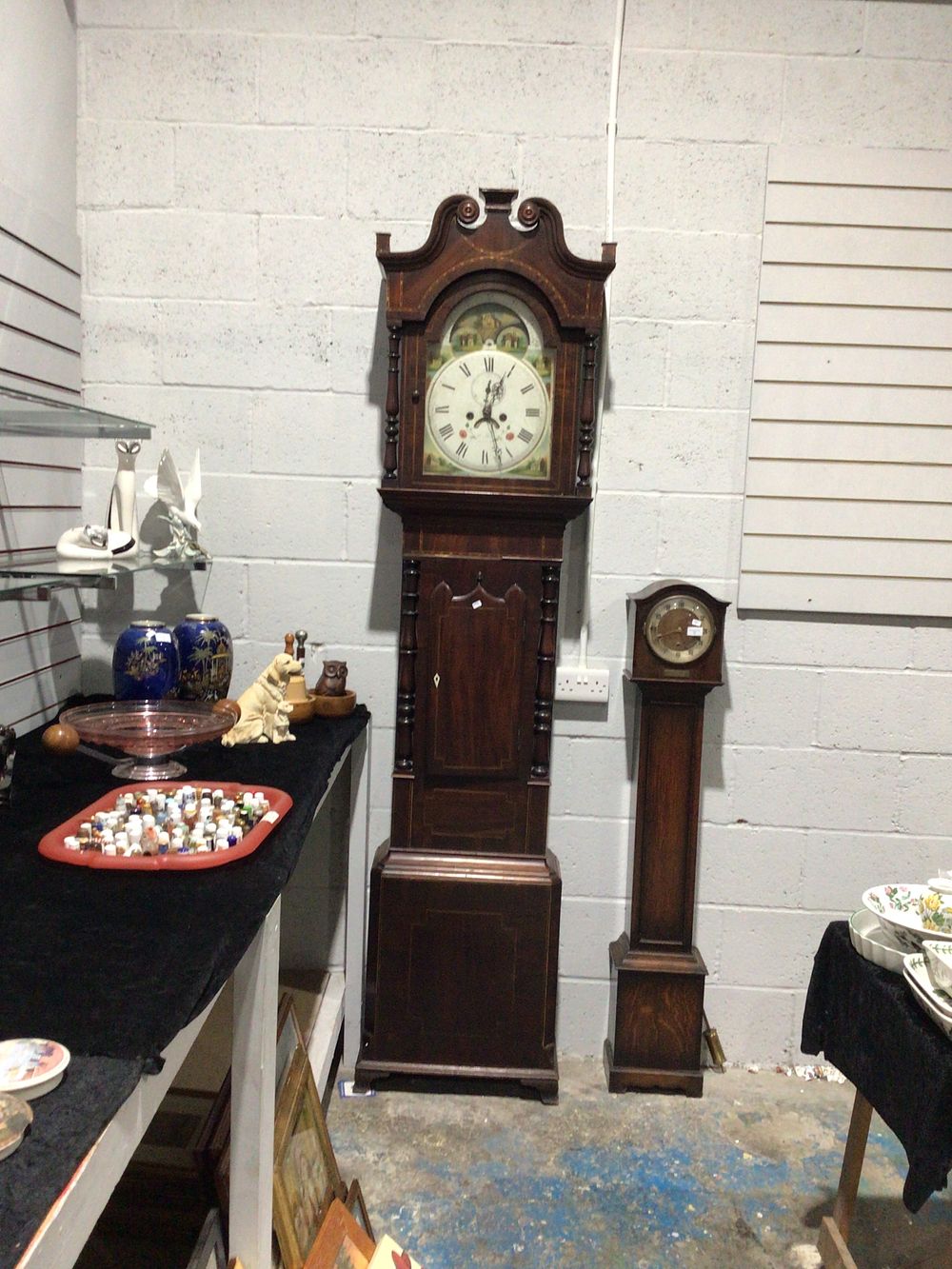 Lot 180: A George III Mahogany and Oak Longcase Clock,