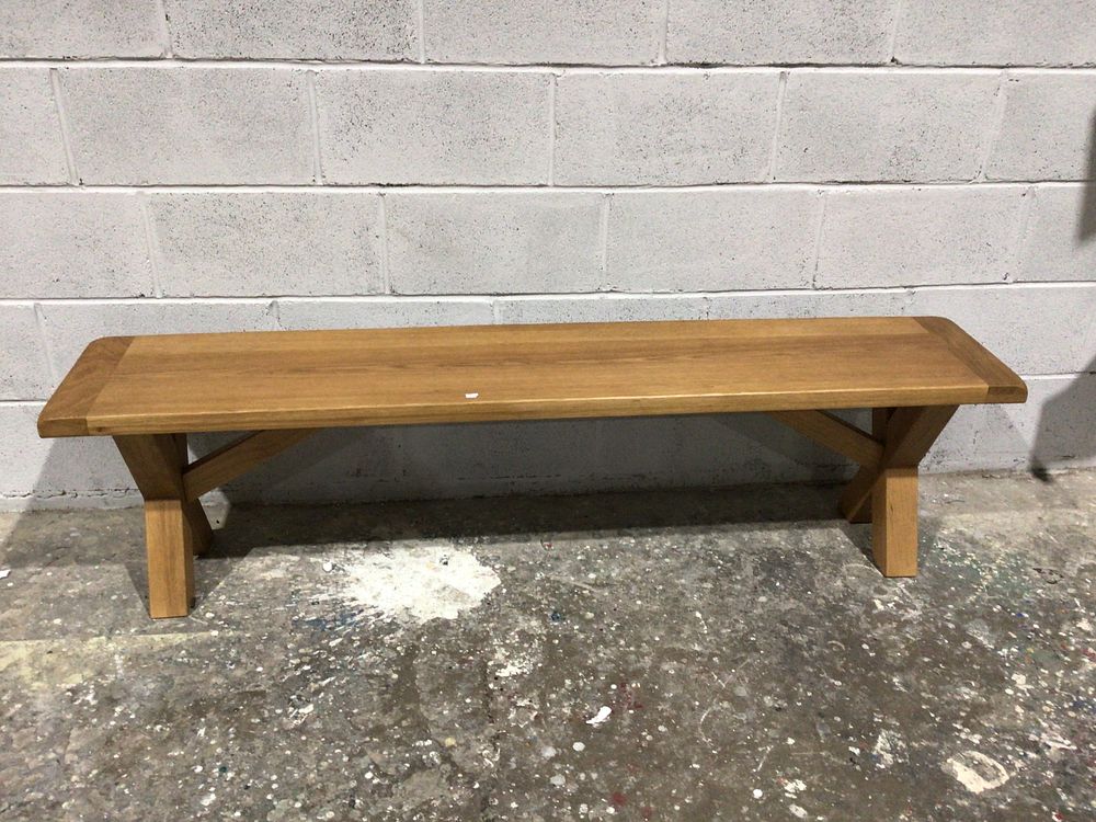 Lot 184: A Modern or Contemporary Light-Toned Wood Bench with X-Frame Trestle Base