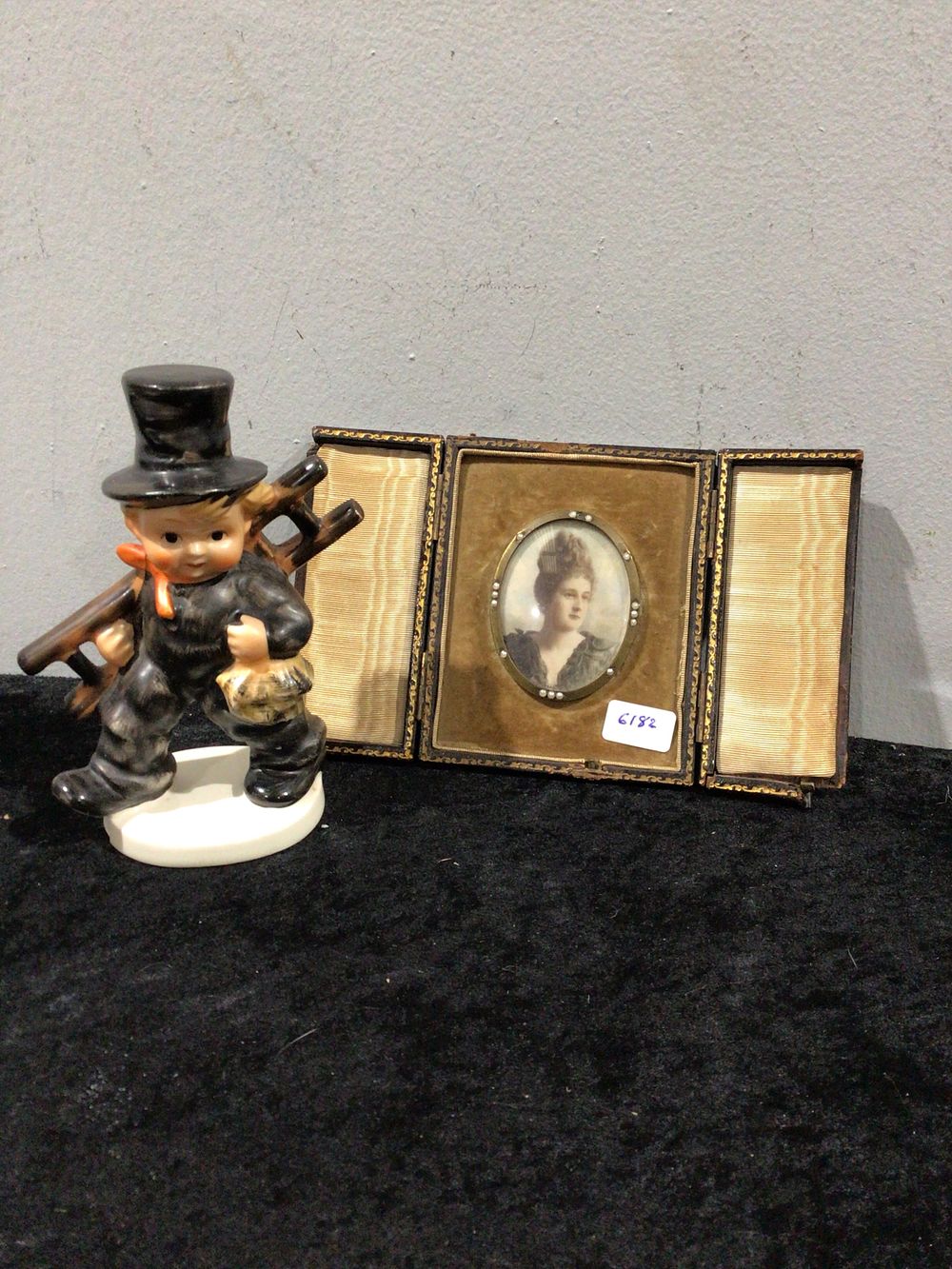 Lot 296: A Hummel Goebel 'Chimney Sweep' Figurine and a Gilt Metal Triptych Photo Frame With Miniture painting