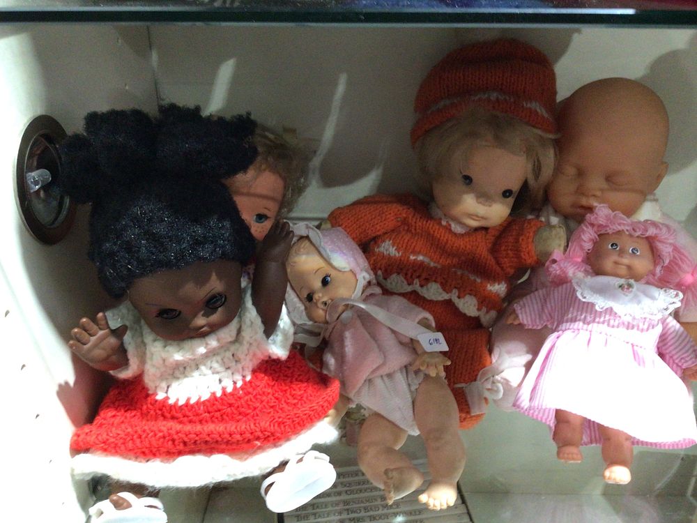 Lot 310: A Collection of Six Assorted Dolls, including Cabbage Patch Kids