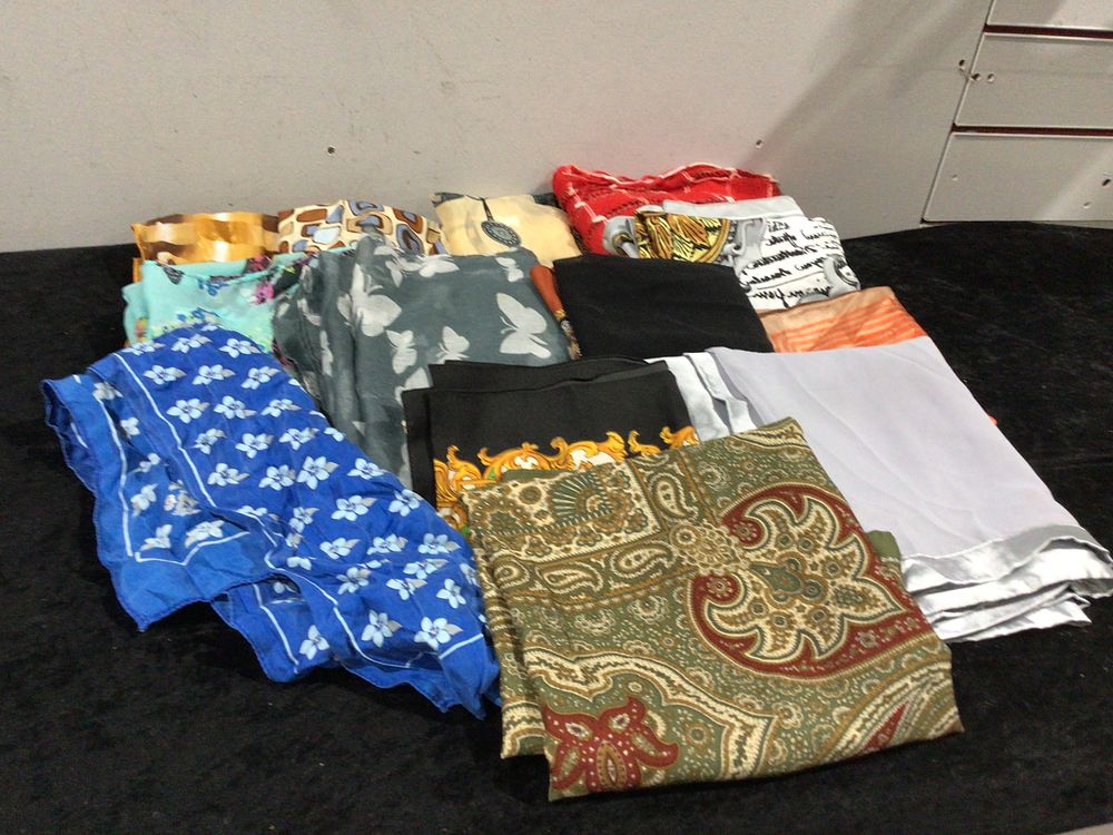 Lot 345: A Collection of Assorted Textile Scarves and Wraps