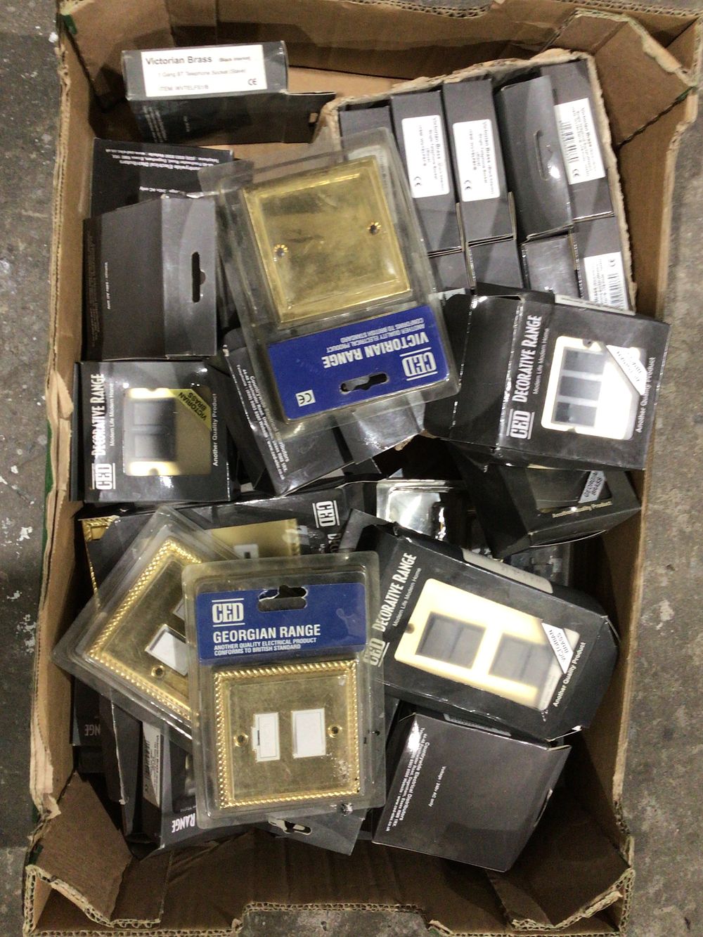 Lot 354: A Collection of CED New Old Stock Decorative Brass Electrical Accessories