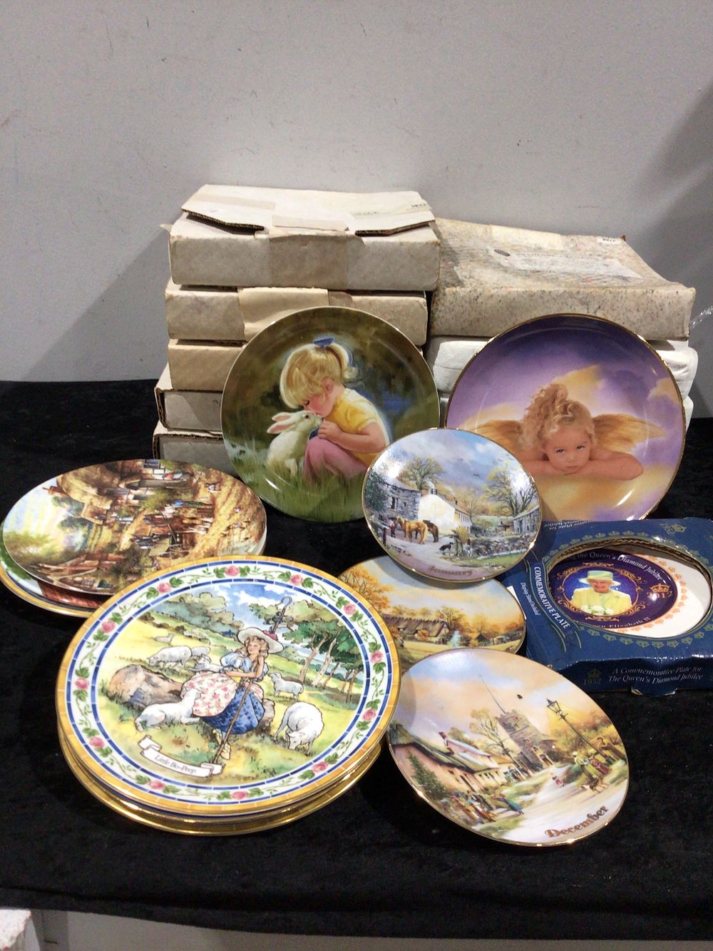 Lot 358: A Collection of Collector's Plates by Sandra Kuck and Thomas Kinkade, with a Commemorative Plate