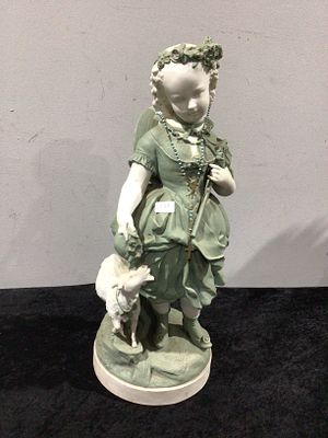 A Late 19th / Early 20th Century European Bisque Porcelain Figurine of a Shepherdess. This 