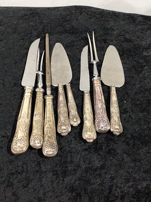 A Collection of Kirk Repousse Pattern Silver-Handled Carving and Serving Utensils. A collection 