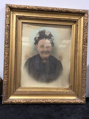 A Late 19th/Early 20th Century Hand-Colored Photographic Portrait of an Elderly Woman in a 