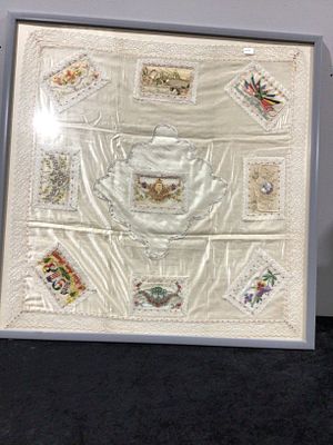A Framed Set of World War One Embroidered Silk Postcards. This framed textile artwork features 