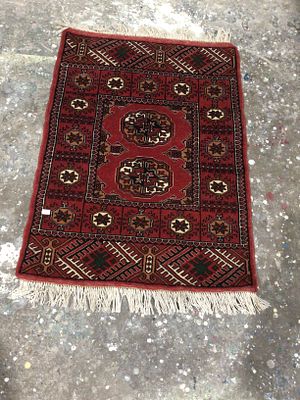Afghan Hand-Knotted Bokhara Tribal Geometric Wool Rug. An Afghan hand-knotted Bokhara tribal 