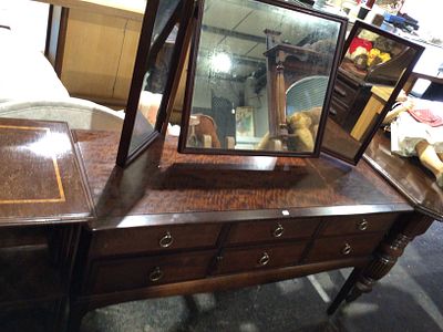 Stag Minstrel Dressing Table with Triple Mirror and Six Drawers. A Stag Minstrel dressing table 